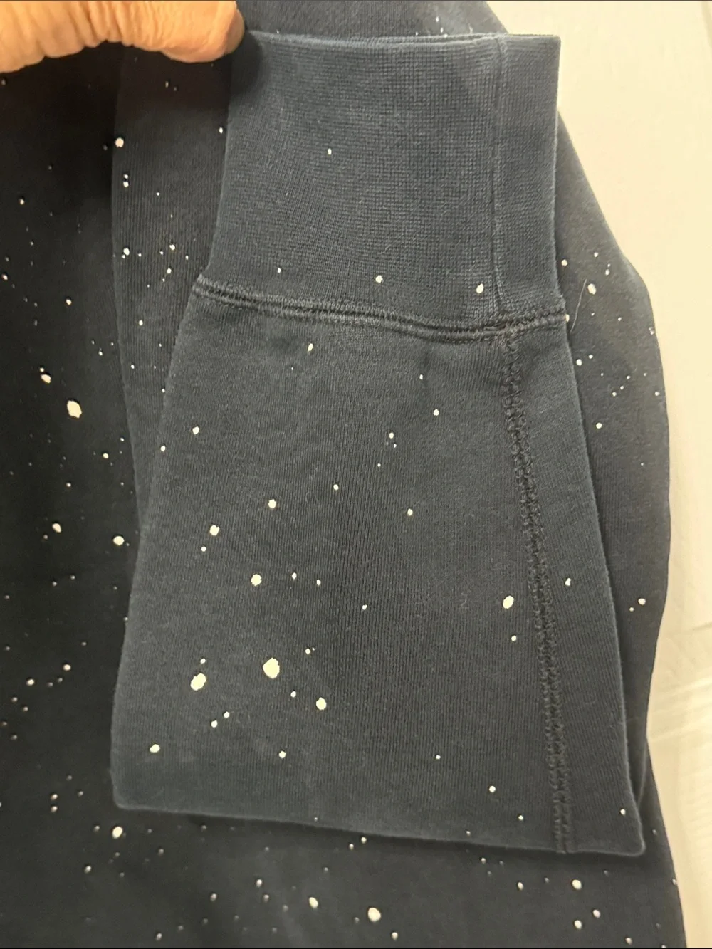 Nike Black Pullover Hoodie with White Swoosh and Paint Speckle